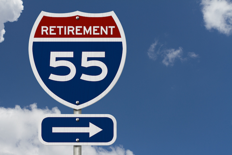 Retirement at 55 ahead message on USA highway sign