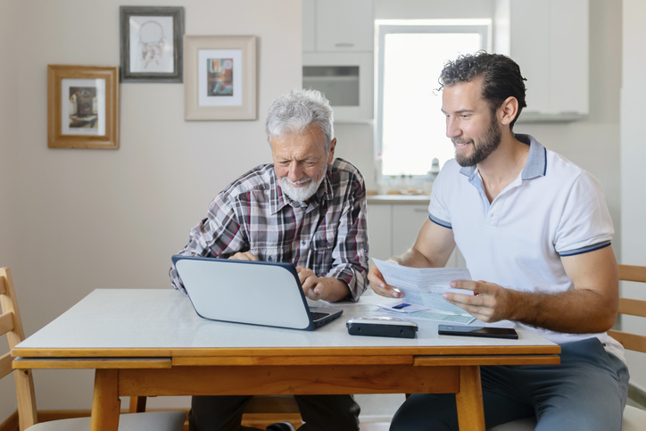 reviewing retirement plan with grandparent